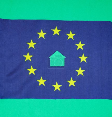 European Union flag. Green home. Concept. European Green Deal. Top view.
