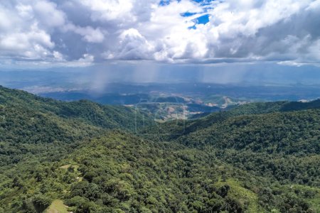 Photo for Beautiful panoramic scenery of northern forest, mountain, and clear sky with white clouds in the area of Omkoi district, Chiang Mai, Thailand. - Royalty Free Image