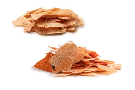 Photo for A group of tasty beer snacks. Dehydrated chicken meat slices. - Royalty Free Image