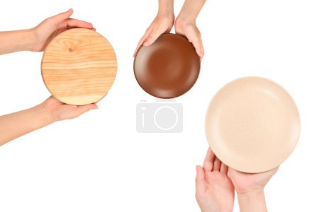 Empty wooden tray in woman hands isolated on white background. 