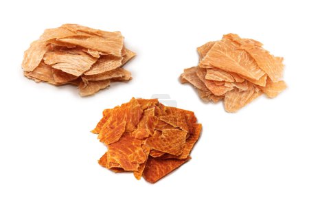 A group of tasty beer snacks. Dehydrated chicken meat slices. 