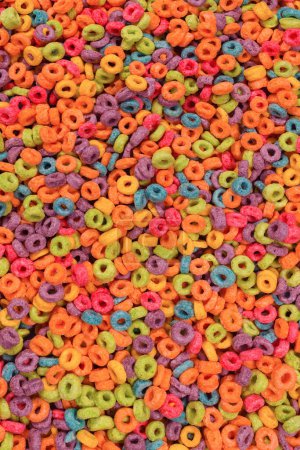Sweet multicolored flakes, cereal loops as a background.. 
