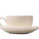 Ceramic white coffee cup and saucer isolated on a white background. 