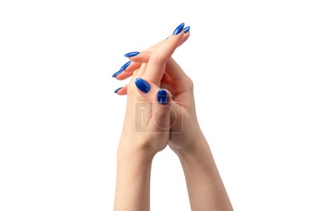 Photo for Hand of a woman with blue nails isolated on a white background. - Royalty Free Image