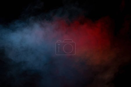 Photo for Blue and yellow steam on a black background. Copy space. - Royalty Free Image