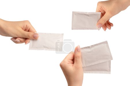 Photo for Wet wipe in a woman hand isolated on a white background. Copy space. - Royalty Free Image