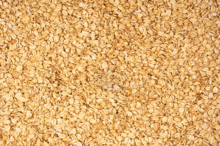 Photo for Oat-flakes as a background. Top view. - Royalty Free Image