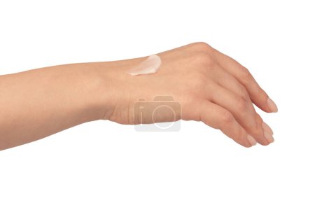 Photo for Beige cream tube in woman hands isolated on a white background. Cream swatch on woman hand.  Skin care concept. - Royalty Free Image