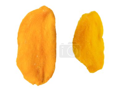 Dry tasty mango slices isolated on a white background. Top view. 