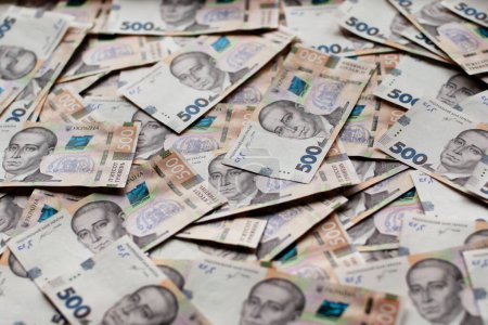 Foto de Billetes de papel moneda ucraniano de hryvnias fondo financiero. Concepto de ahorro o gasto - Imagen libre de derechos