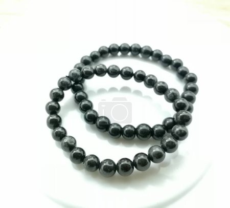 Photo for Black jade stone bracelet product on white background - Royalty Free Image