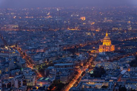 View of Paris at night with the Invalides building, France