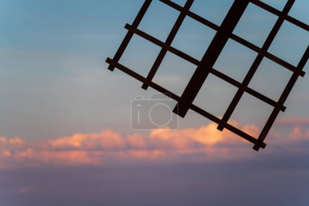 Photo for Spectacular dark old windmill blade against the sky at sunset - Royalty Free Image