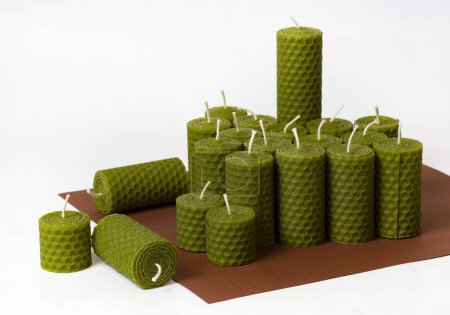 seasonal background a group of green beeswax candles