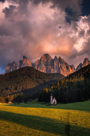 Photo for Clouds over the Odle massif in the Dolomites during sunset - Royalty Free Image