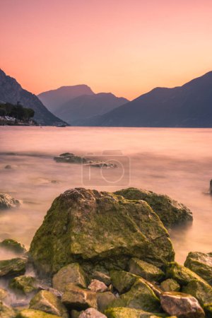 Photo for Colorful sky at sunrise over Lake Garda - Royalty Free Image