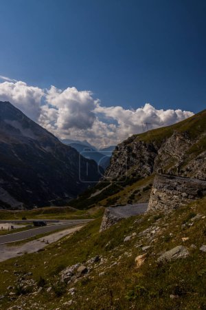 Photo for Clouds over mountain scenic road Stelvio Pass in Alps - Royalty Free Image