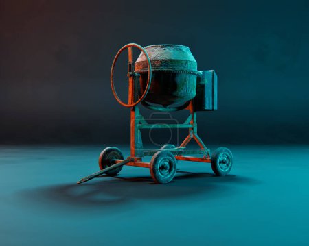 Foto de Mezclador de hormigón en luz roja y azul. Captura de estudio. - Imagen libre de derechos