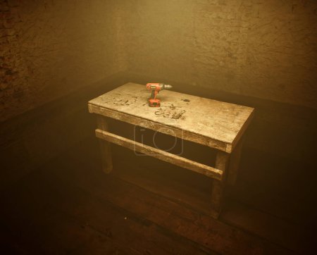 Foto de Taladro eléctrico rojo sobre una vieja mesa de madera en un taller polvoriento. - Imagen libre de derechos