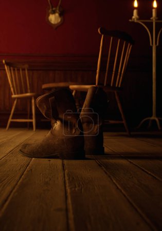 Foto de Interior rústico vintage con botas de vaquero de cuero, suelo de madera, mesa de madera, sillas de madera, paneles, candelabro y cráneo de ciervo en la pared. - Imagen libre de derechos