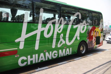 Photo for Chiangmai, Thailand - March 29 2024:  Hop and go Chiangmai Sightseeing  bus. Operate by Greenbus Company. - Royalty Free Image