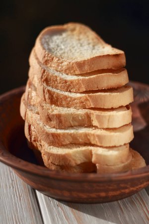 Photo for Freshly fried toasted bread stacked closeup. Shallow depth of field - Royalty Free Image