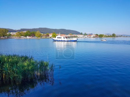Photo for Ioannina city lake area with platanus trees on ring road of lake  pamvotis greece - Royalty Free Image