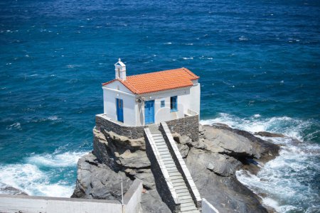 andros island greece panagia thalassini church wavy sea in windy sunny day