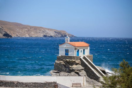 andros island greece panagia thalassini church wavy sea in windy sunny day