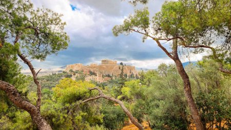 athens parthenon greece from philopappos monumnet view pine trees cloudy day