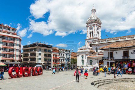 Photo for Cuenca, Ecuador - August 12, 2022: San Francisco Plaza (square) in historical center of city Cuenca, UNESCO world heritage site, city name sign "Cuenca" with view of Sun Francisco church at background - Royalty Free Image