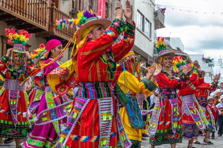 Photo for Cuenca, Ecuador - December 24, 2022: Pase del Nio Viajero (Traveling Child) Christmas Parade in Cuenca. UNESCO cultural heritage. Bolivian dancers - Royalty Free Image