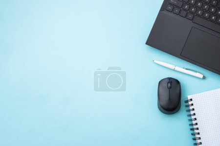 Photo for Office desk flat lay background with laptop, notepad and pen. - Royalty Free Image