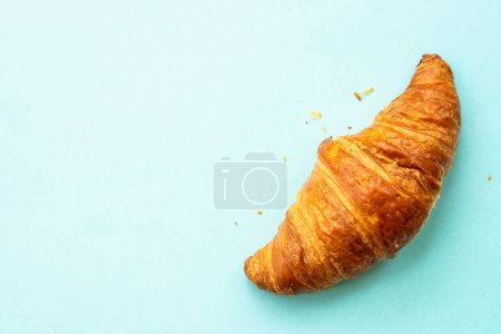 Photo for Croissant at blue background. French bakery. Flat lay. - Royalty Free Image