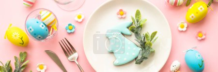 Photo for Easter food background with holiday decorations. Easter table setting. Flat lay long format. - Royalty Free Image