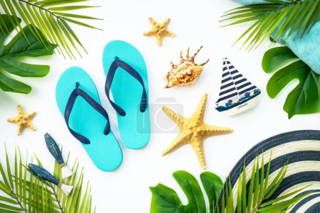 Photo for Summer holidays, vacation and travel background. Palm leaves, sea shells and decor on white. Flat lay with copy space. - Royalty Free Image