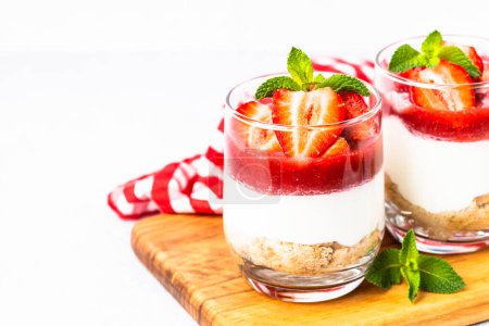 Photo for Strawberry cheesecake in glass, no baking dessert. - Royalty Free Image
