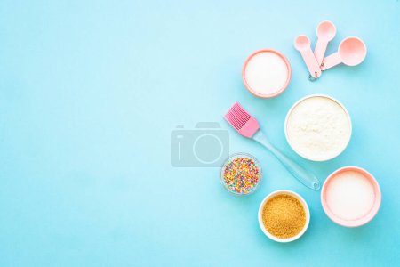 Photo for Food baking background. Ingredients for cooking at blue. Flat lay. - Royalty Free Image