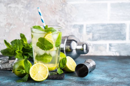 Photo for Mojito with rum and lime on black background. Traditional Summer iced drink. - Royalty Free Image