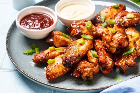 Photo for Chicken wings in bbq sauce grilled . Restaurant dish, meat griill. - Royalty Free Image