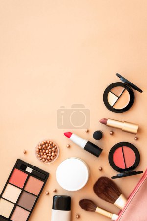 Photo for Make-up beauty products at pastel background. Powder, foundation, mascara, lipsticks. Flat lay. - Royalty Free Image