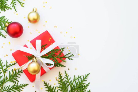 Photo for Christmas Present, christmas tree and decorations at white background. Flat lay image with copy space. - Royalty Free Image