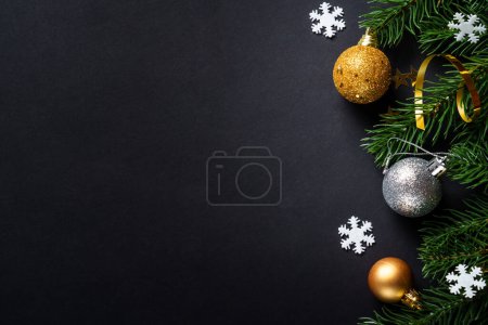 Photo for Christmas greeting card. Christmas background with white and gold holiday decorations. Flat lay with copy space at black. - Royalty Free Image