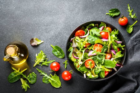 Photo for Healthy food, vegan bowl. Green Salad with fresh leaves and vegetables. Flat lay with copy space. - Royalty Free Image
