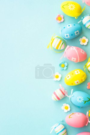 Photo for Easter eggs on blue background. Flat lay with copy space. - Royalty Free Image