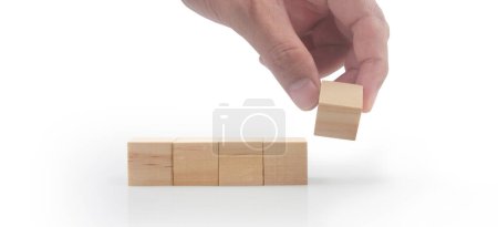 Foto de Cubos de madera en mano con espacio de copia para texto de entrada e infografía - Imagen libre de derechos