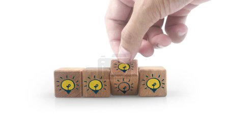 Photo for Wooden cubes in a hand with copy space for input wording and infographic - Royalty Free Image