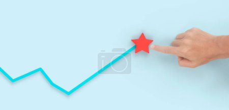 Photo for Hand touching graphs of financial indicator and accounting market economy analysis chart - Royalty Free Image