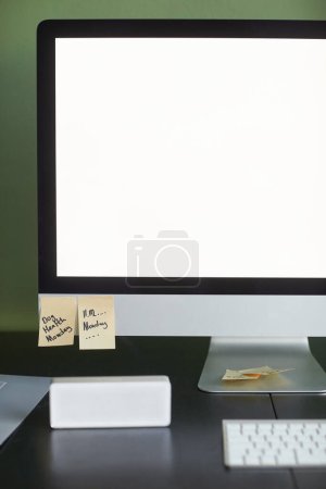 Photo for Vertical background image of home office workplace with blank computer screen - Royalty Free Image