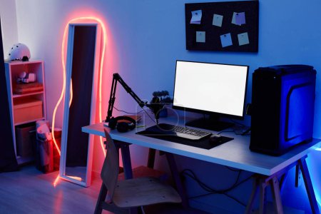 Téléchargez les photos : Image de fond de la salle de jeux pour adolescents avec éclairage au néon bleu et maquette de l'écran du PC, espace de copie - en image libre de droit
